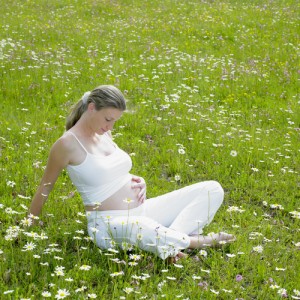Pregnant woman contemplating hypnotherapy for birth.